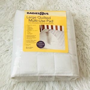 crib sheet saver pad